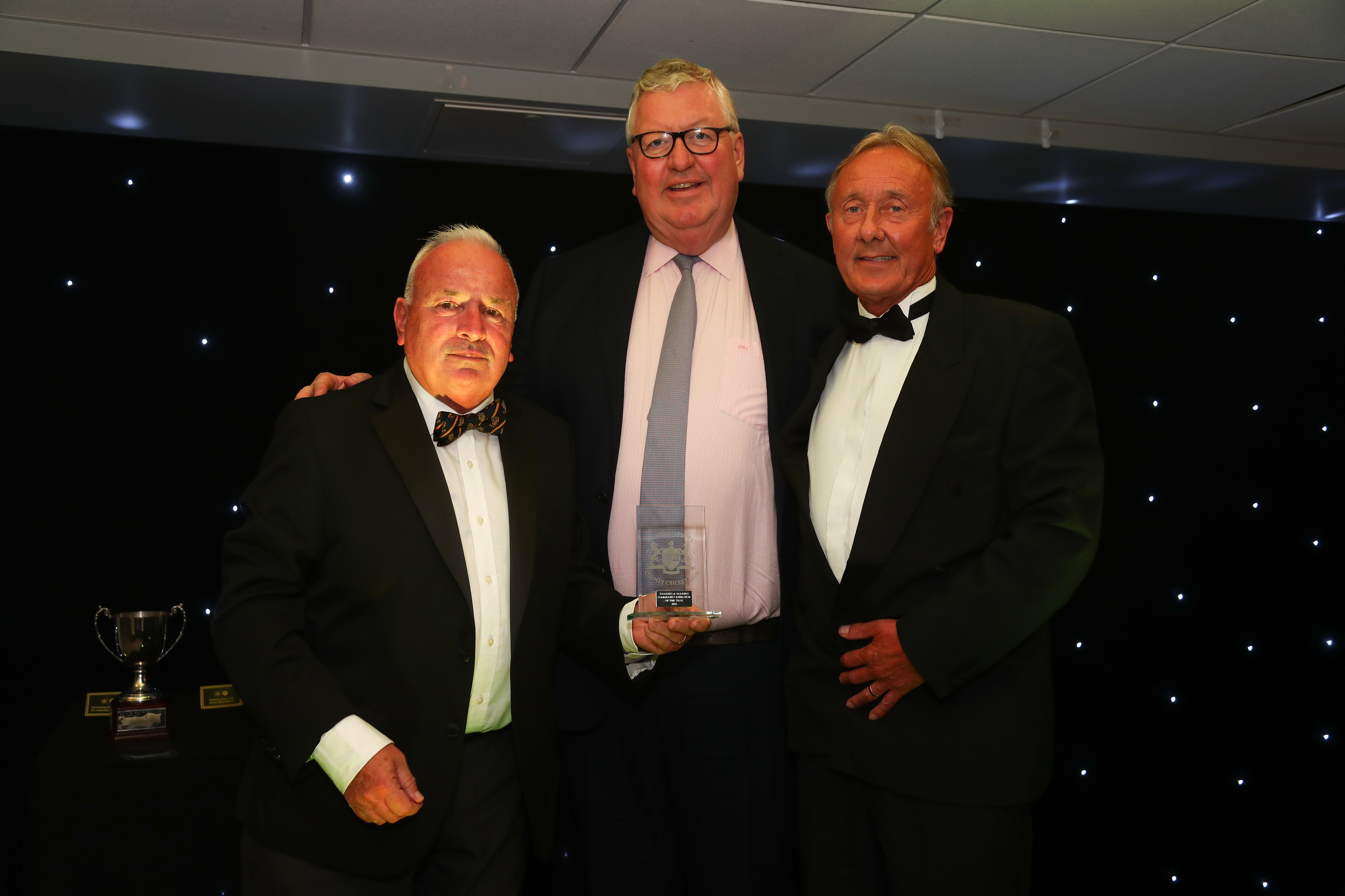 Andy Brassington receives the Community Initiative of the Year Award on behalf of Walkers and Talkers at the Gloucestershire Cricket End of Season Gala Dinner